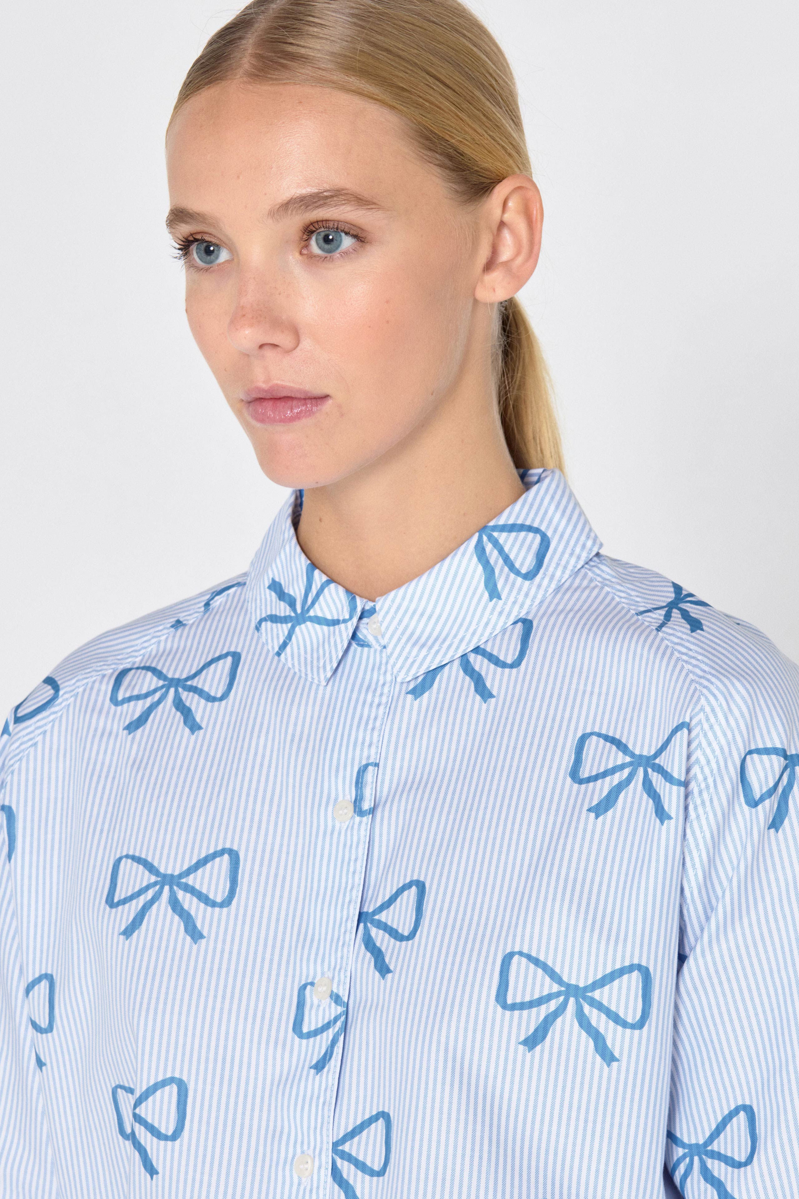 BOW CAMISA MANGA RAGLÁN