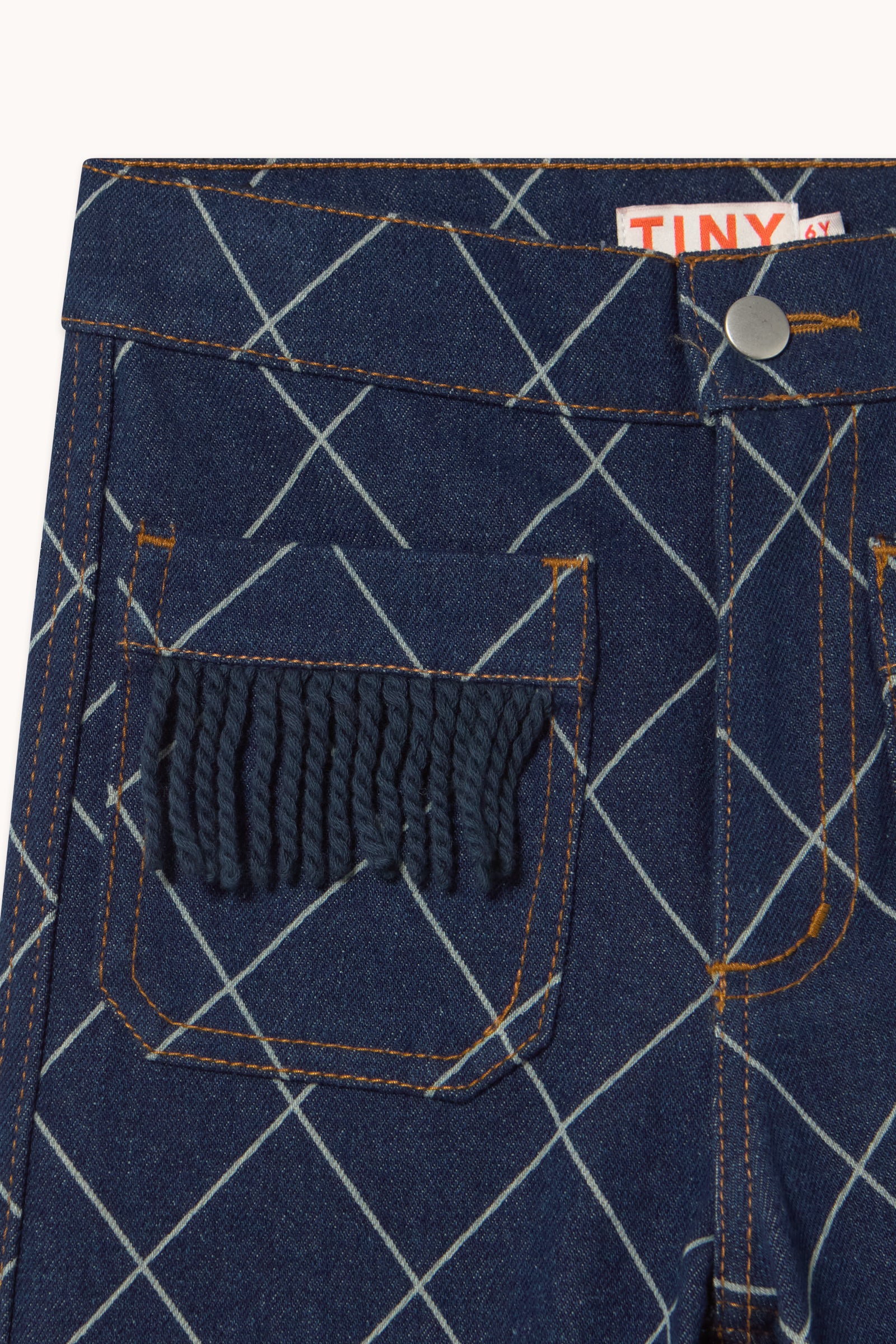 DENIMHOSE MIT FRANSEN DIAMOND PATTERN