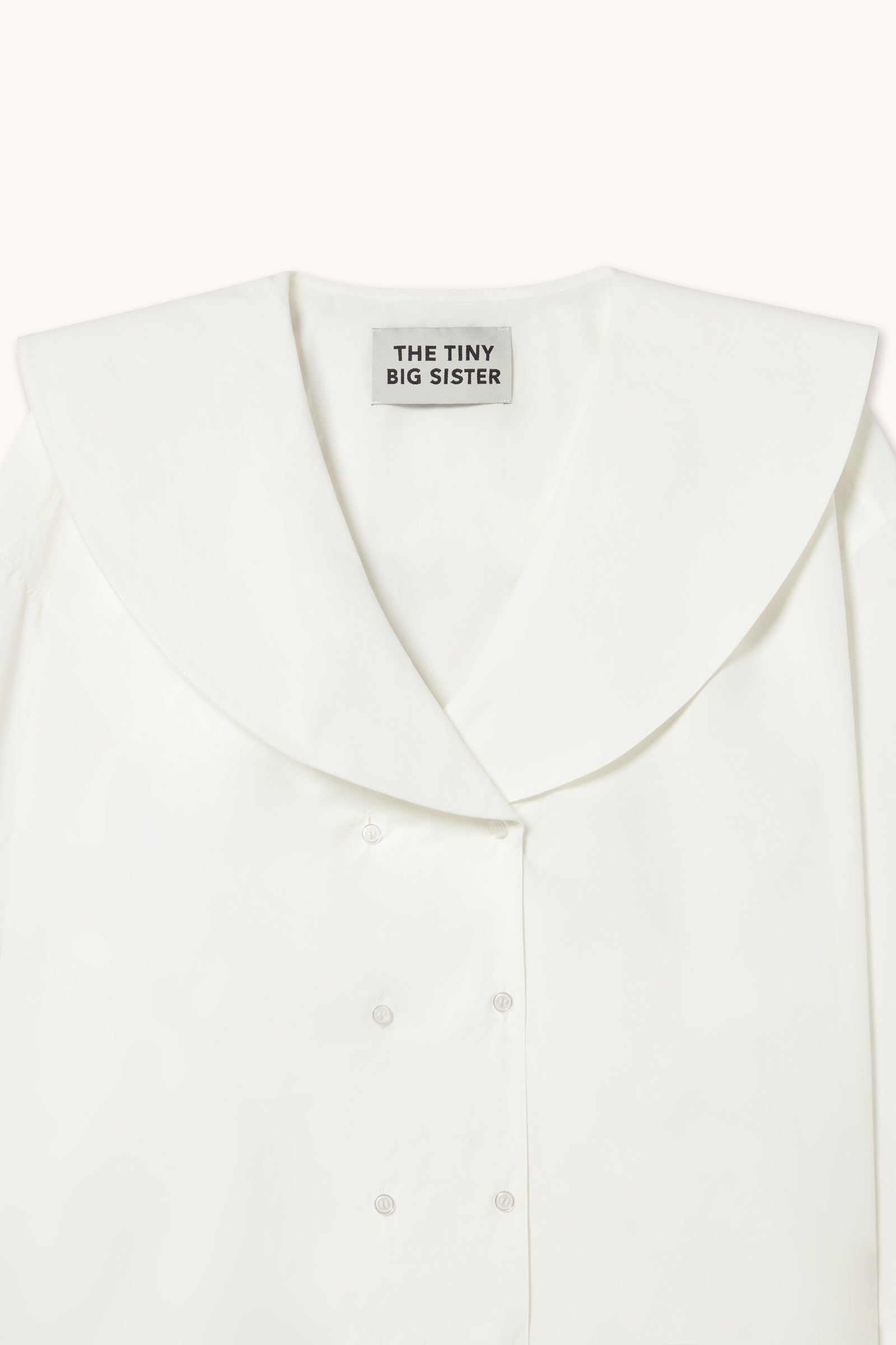 CHEMISE À DOUBLE BOUTONNAGE