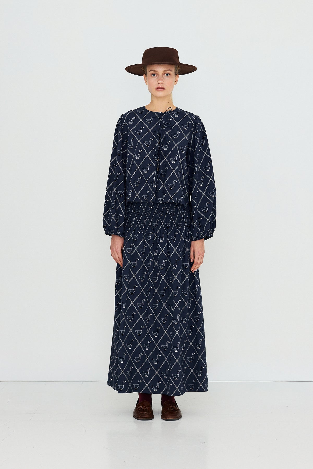 BLUSE MIT SCHLEIFE GEESE