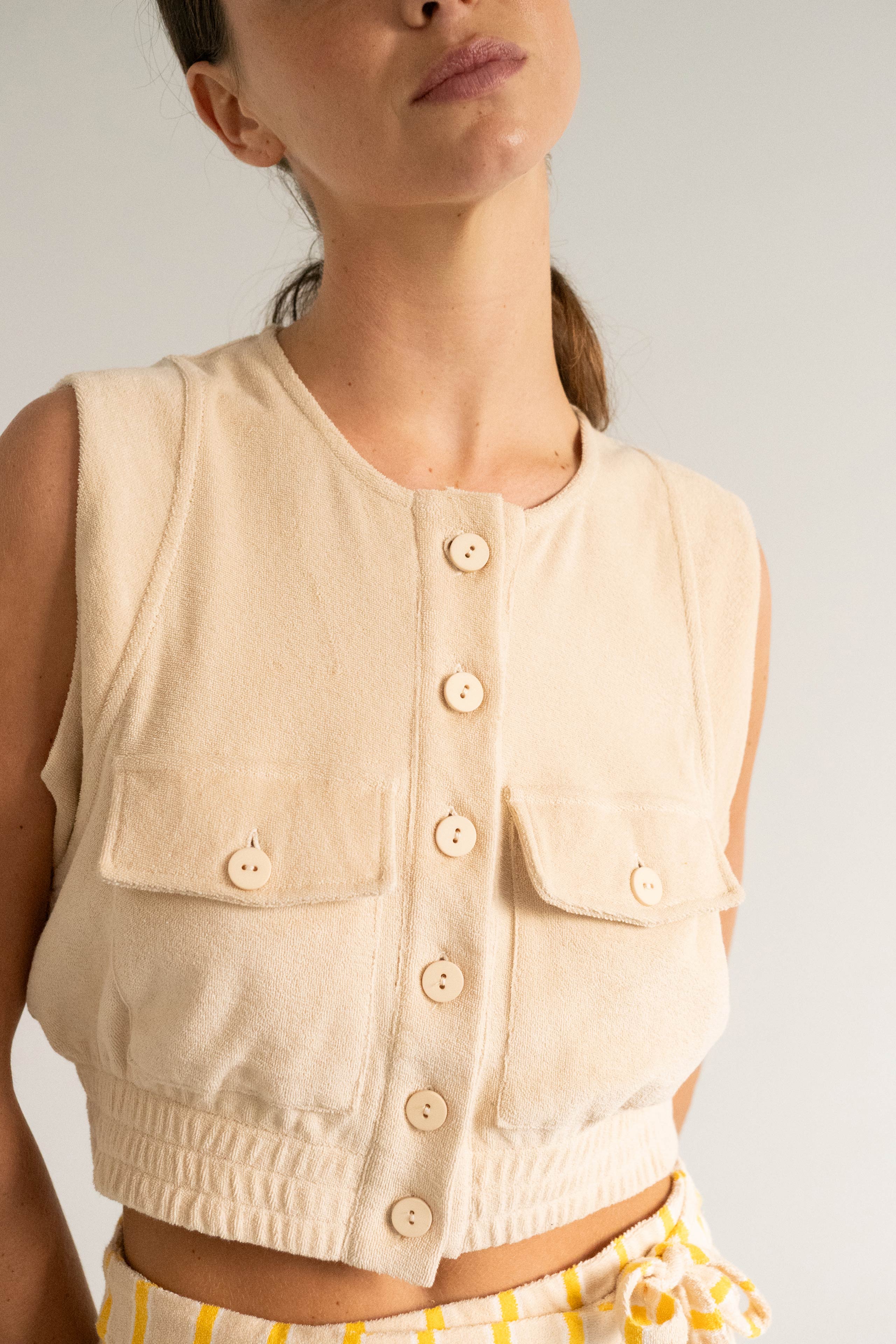 TOP CON BOLSILLOS DE TOALLA