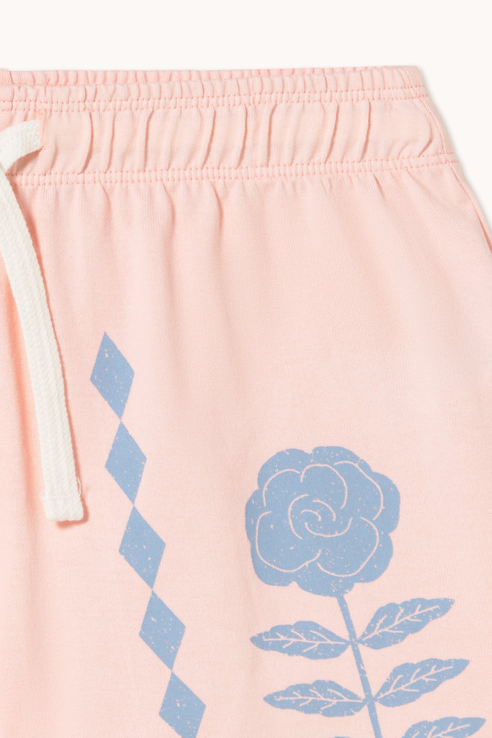 FLOWER PATTERN GRAPHIC SHORTS
