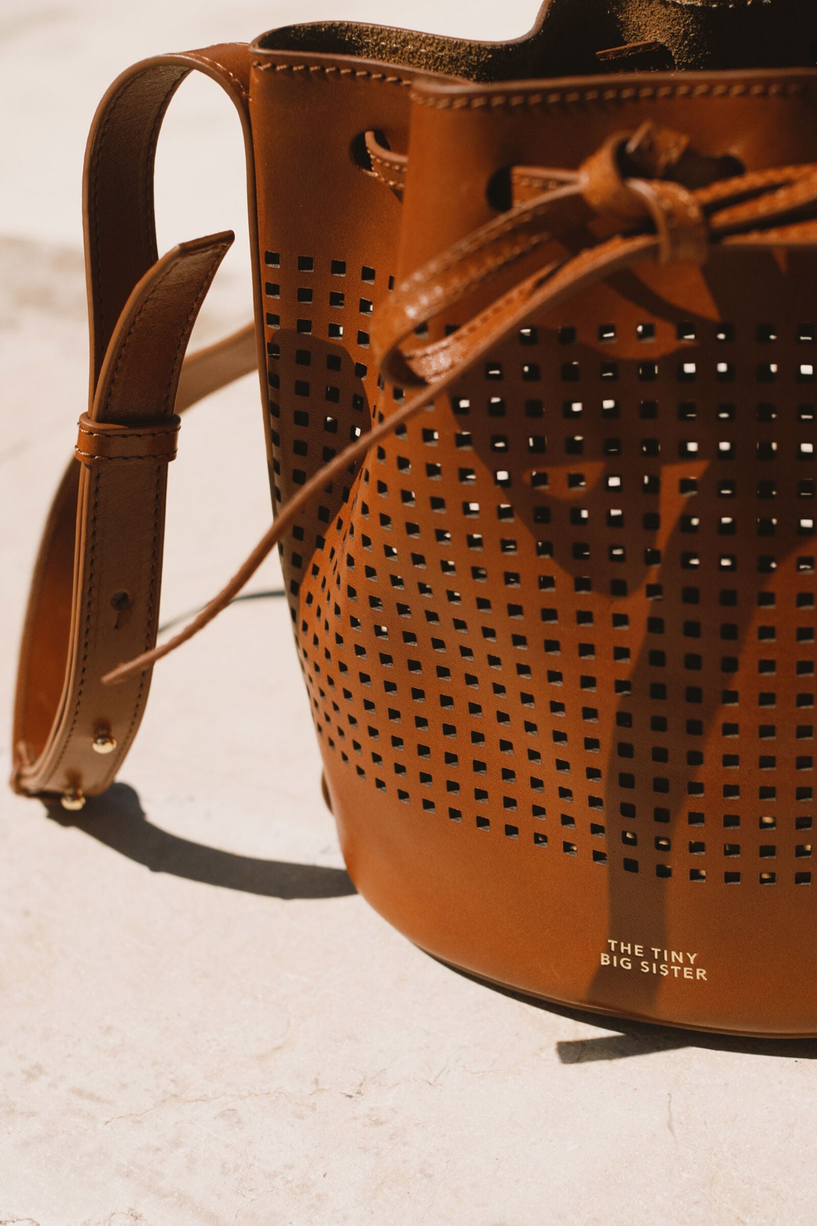 ANNE PERFORATED LEATHER SMALL BUCKET BAG