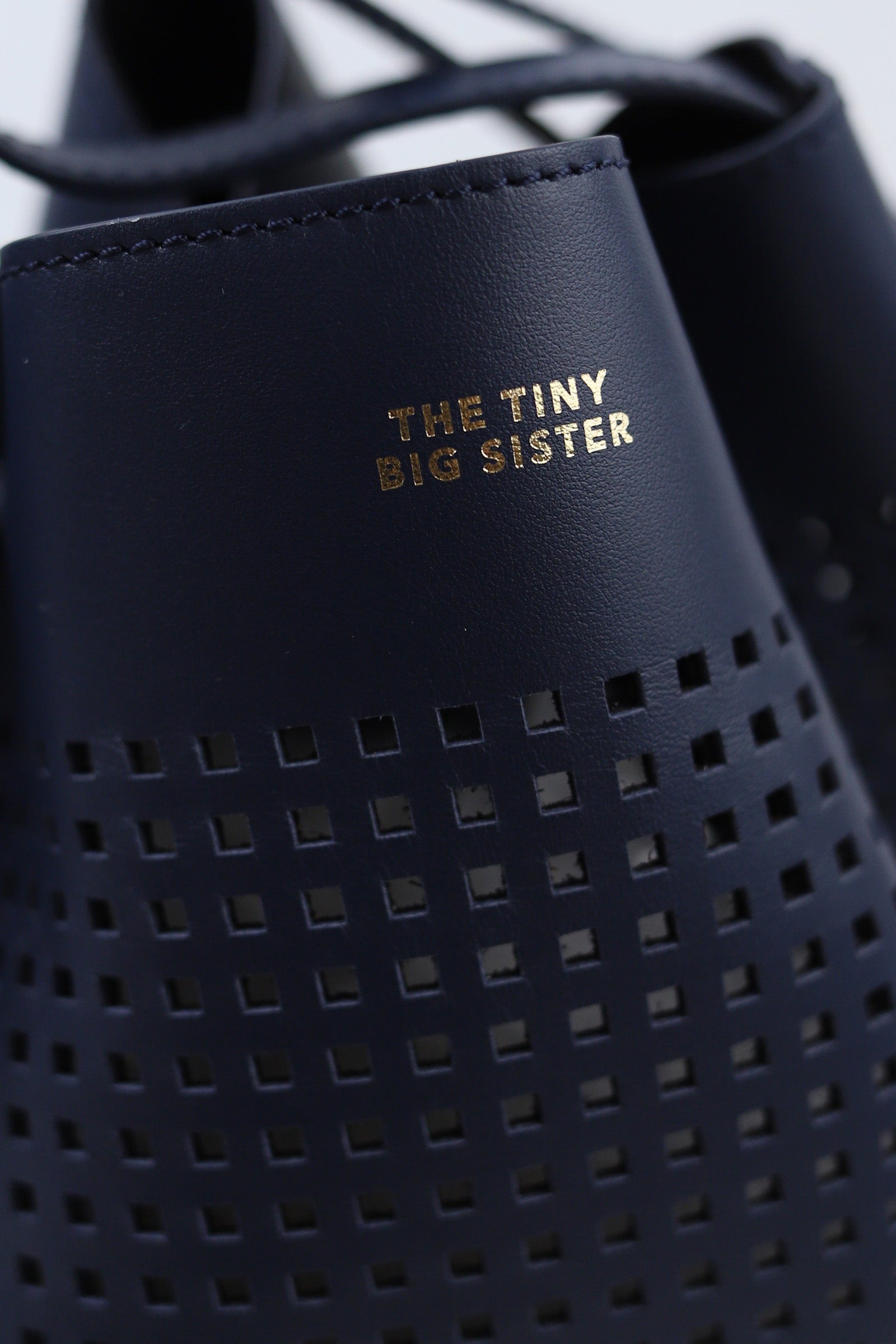 AUGUSTA PERFORATED LEATHER BAG
