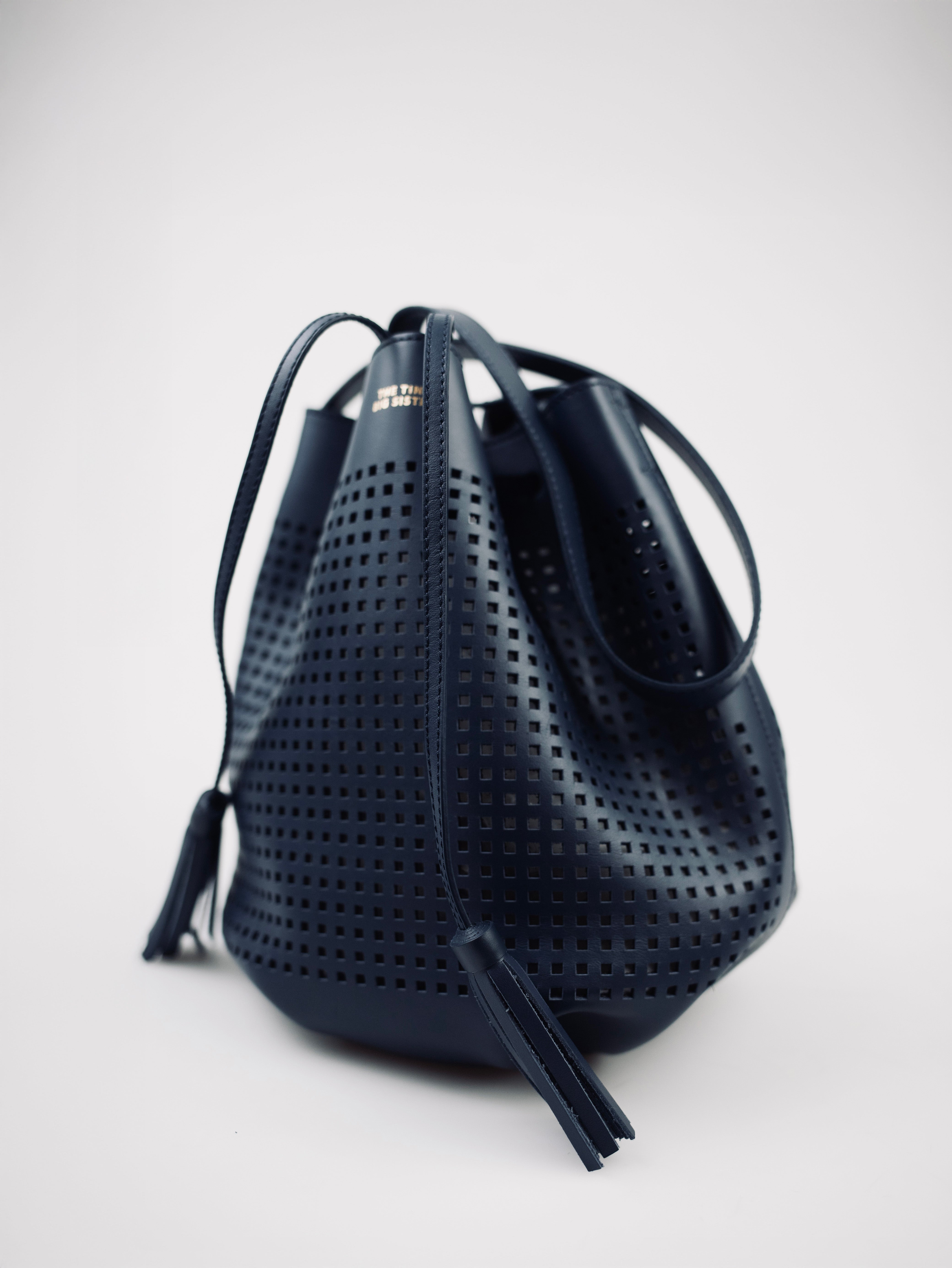 AUGUSTA PERFORATED LEATHER BAG