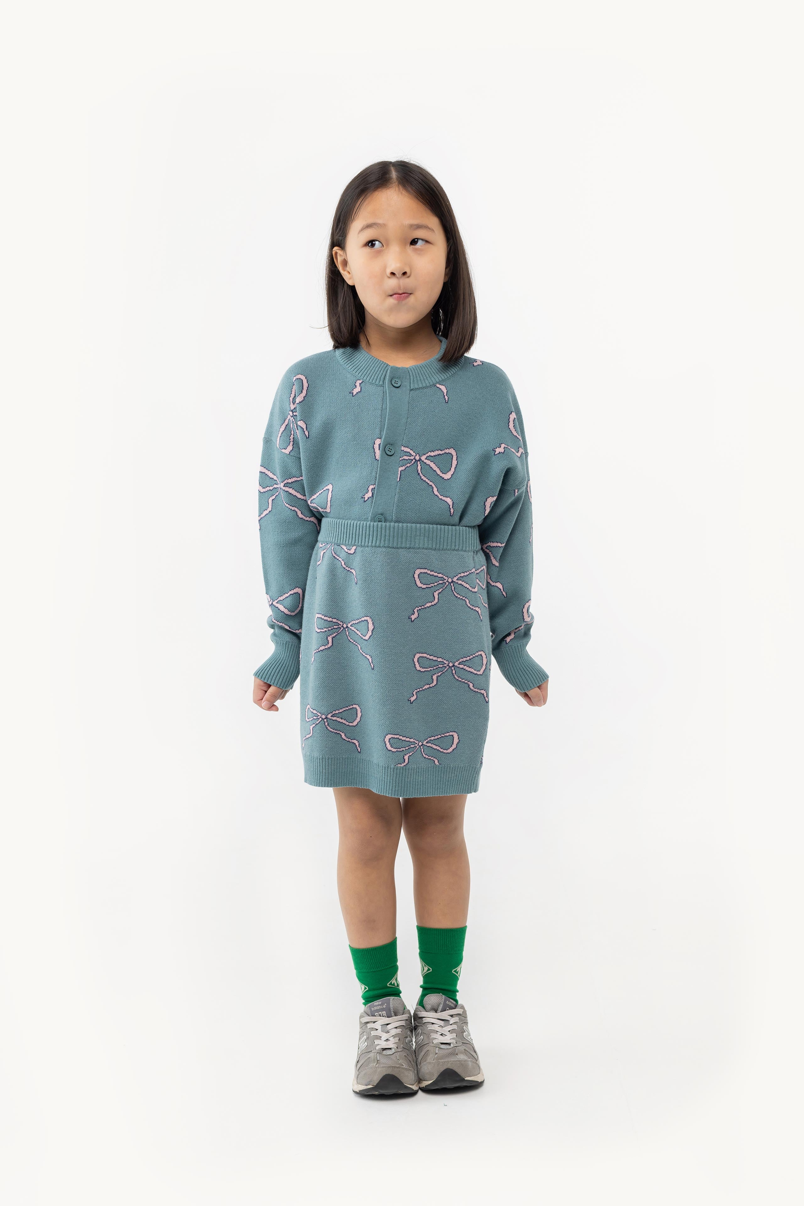 BOW MOCKNECK CARDIGAN