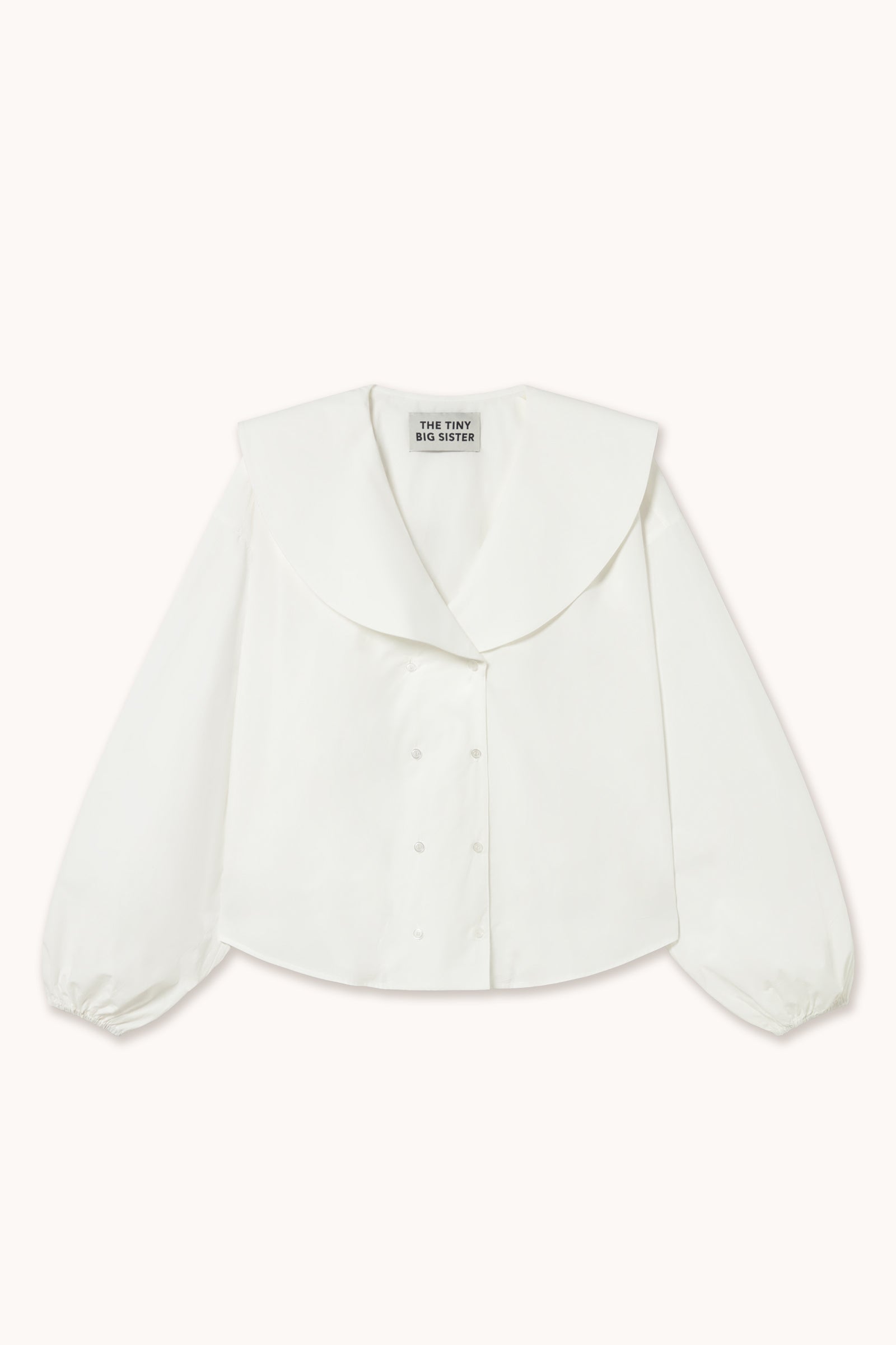 CHEMISE À DOUBLE BOUTONNAGE