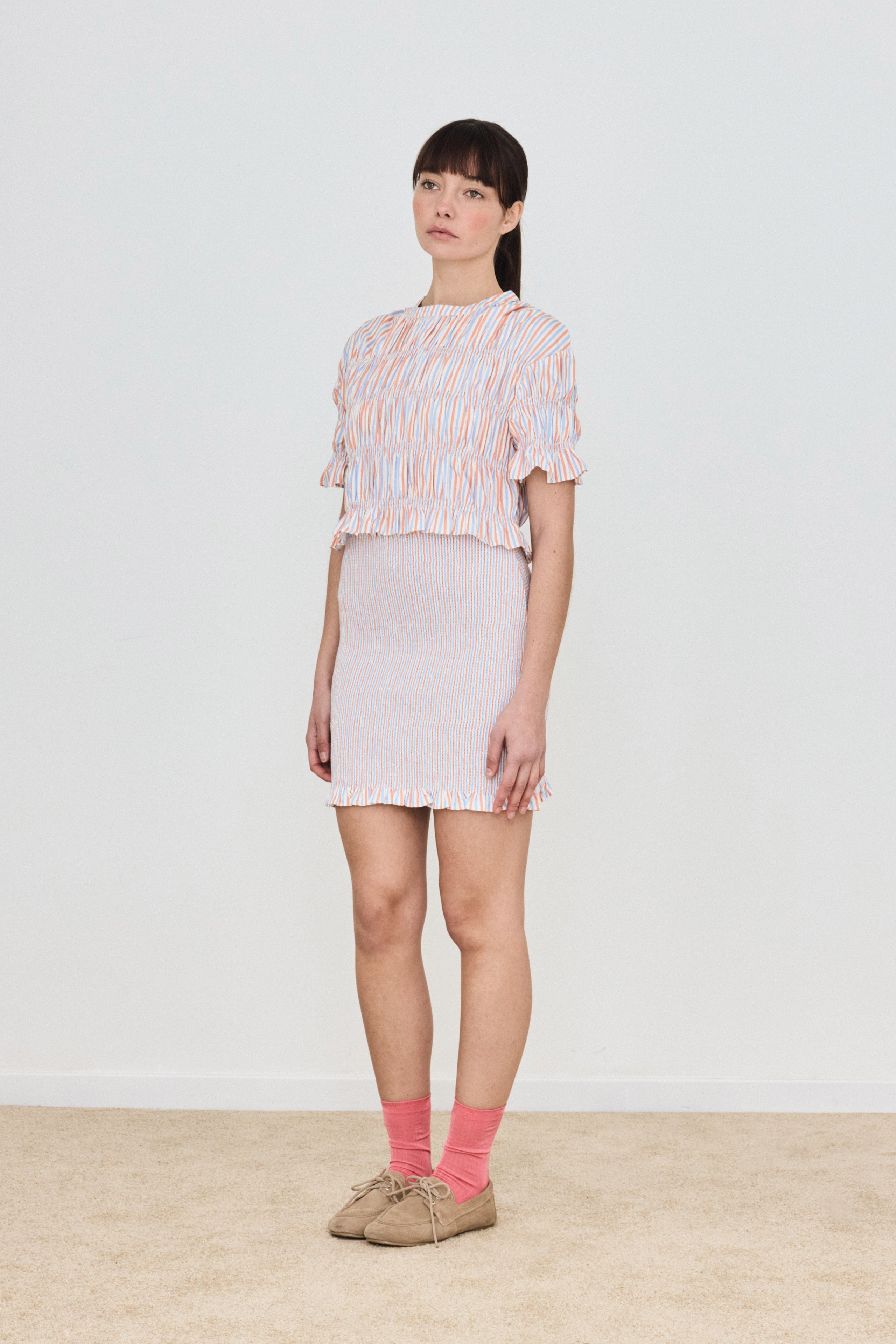 STRIPED SMOCK MINI SKIRT