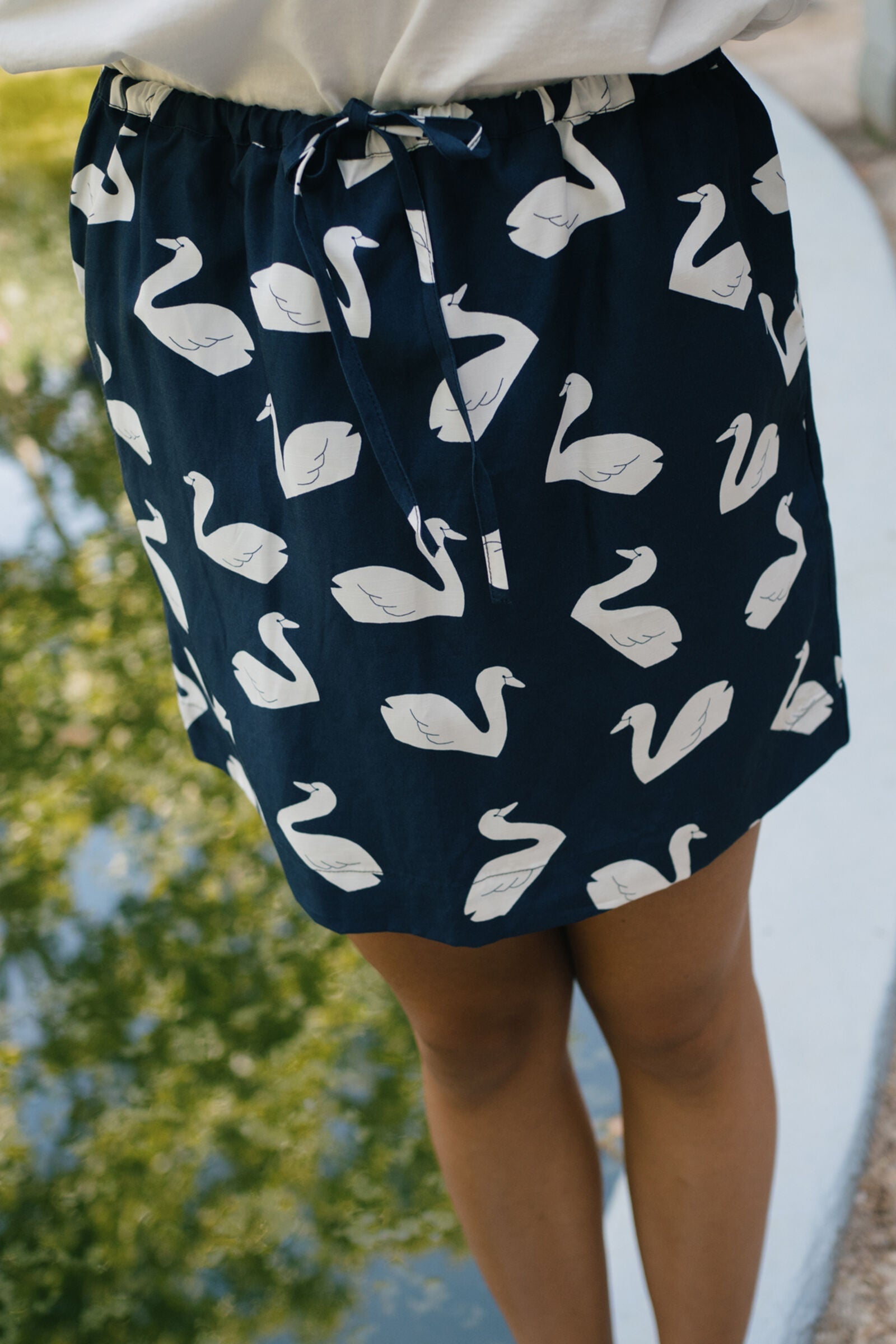 SWANS MINI SKIRT