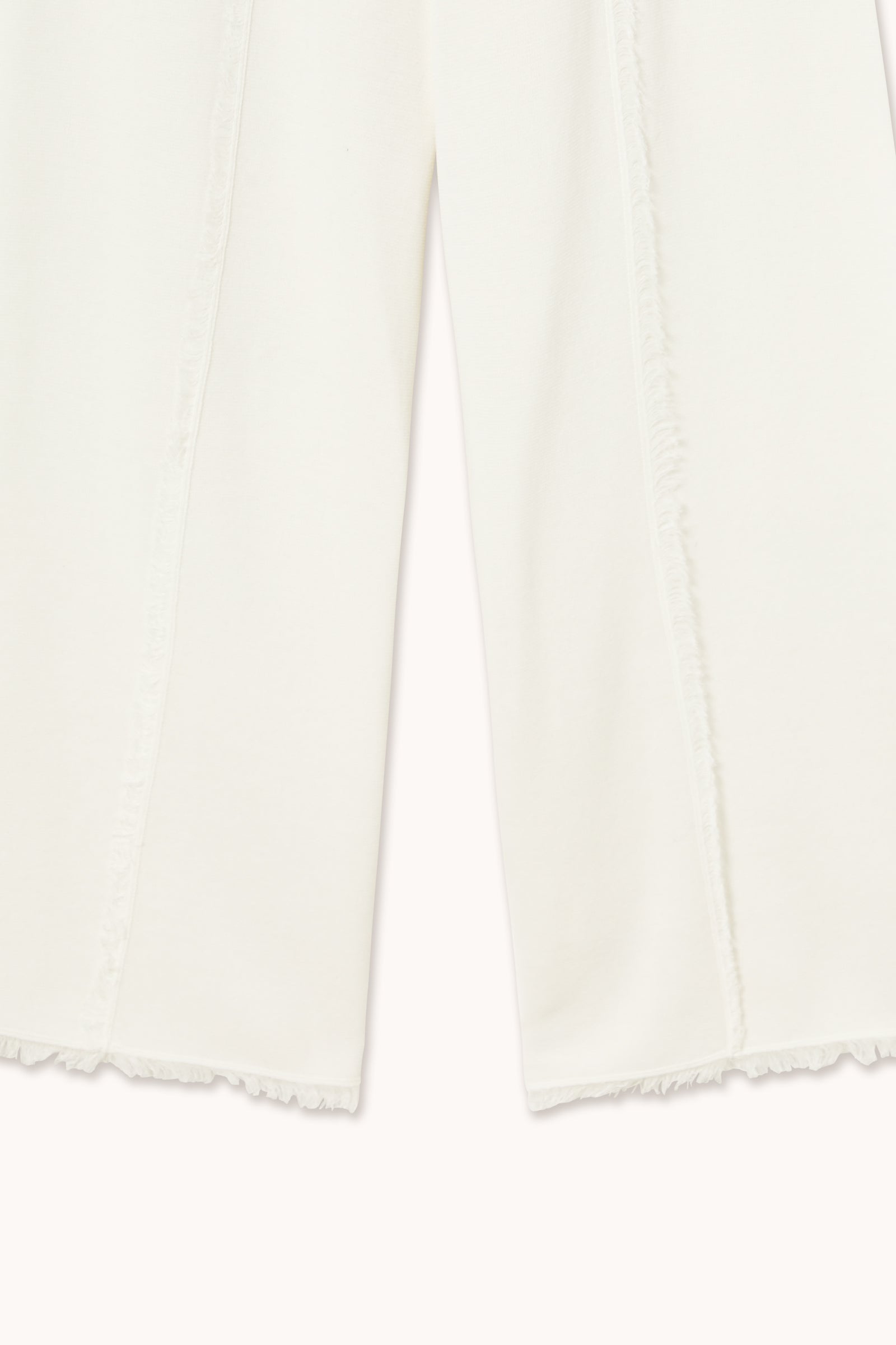 KNITTED PANTS WITH FRINGE