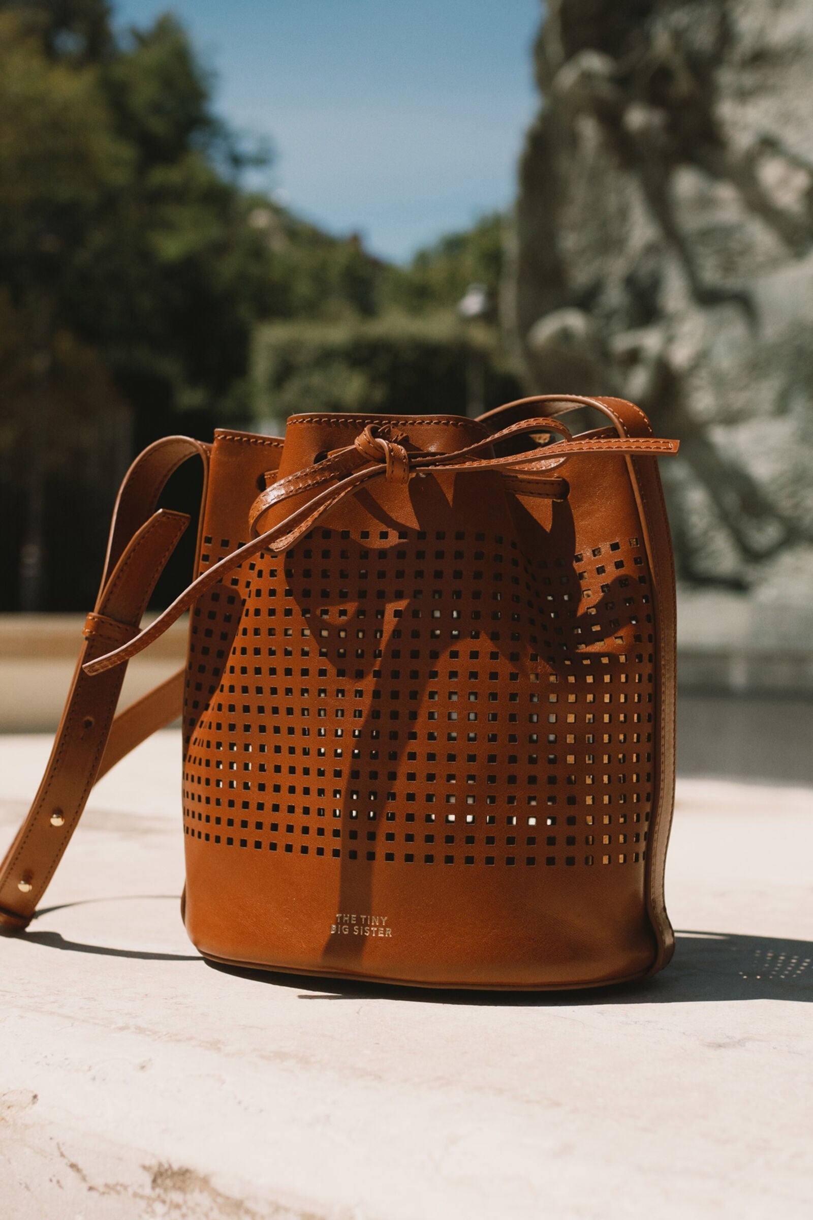 ANNE PERFORATED LEATHER SMALL BUCKET BAG